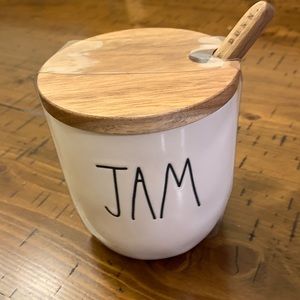 Rae Dunn ceramic Jam canister with wooden top.